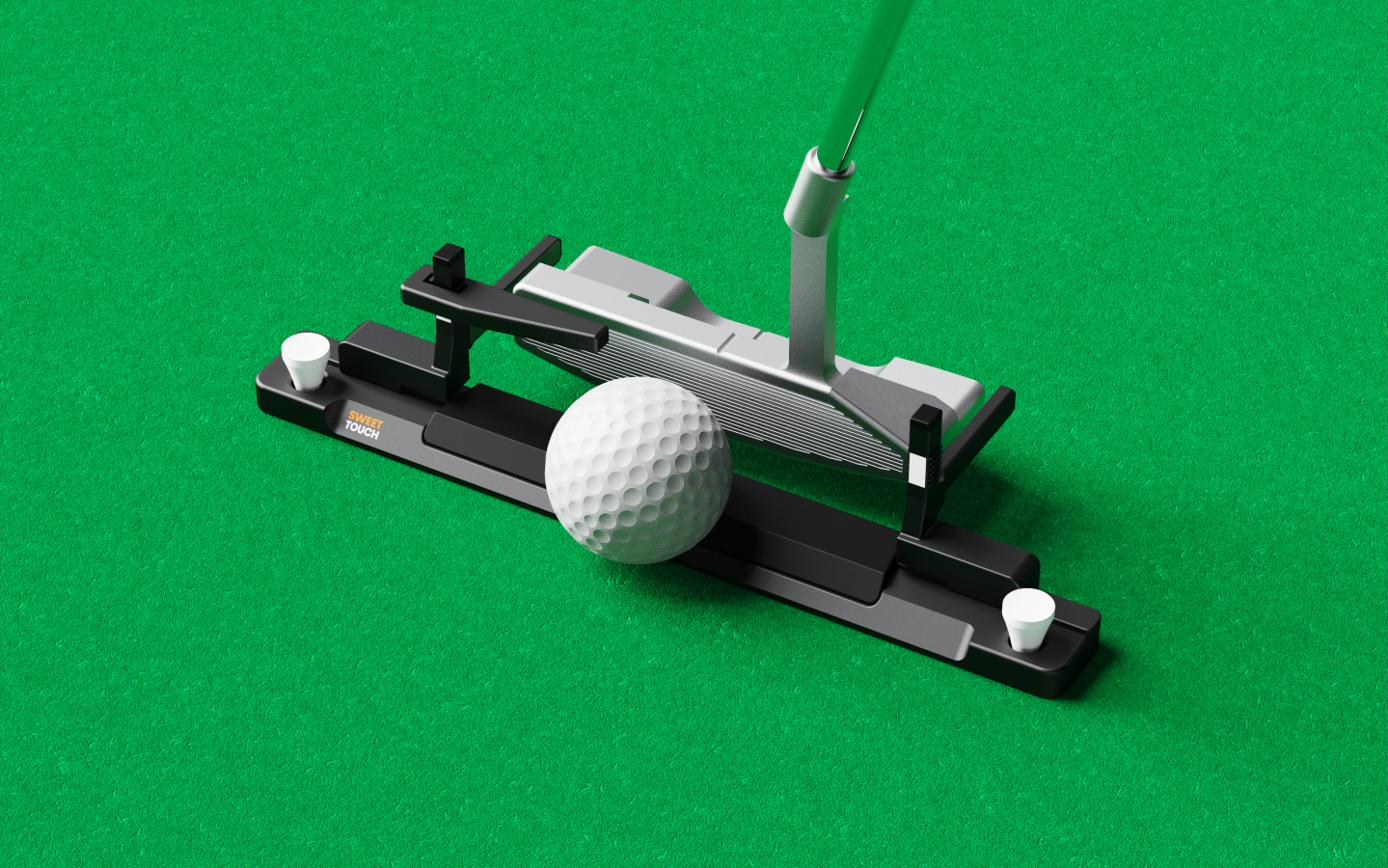 Sweet Touch fixed to a putting green with tees, putter addressing the ball